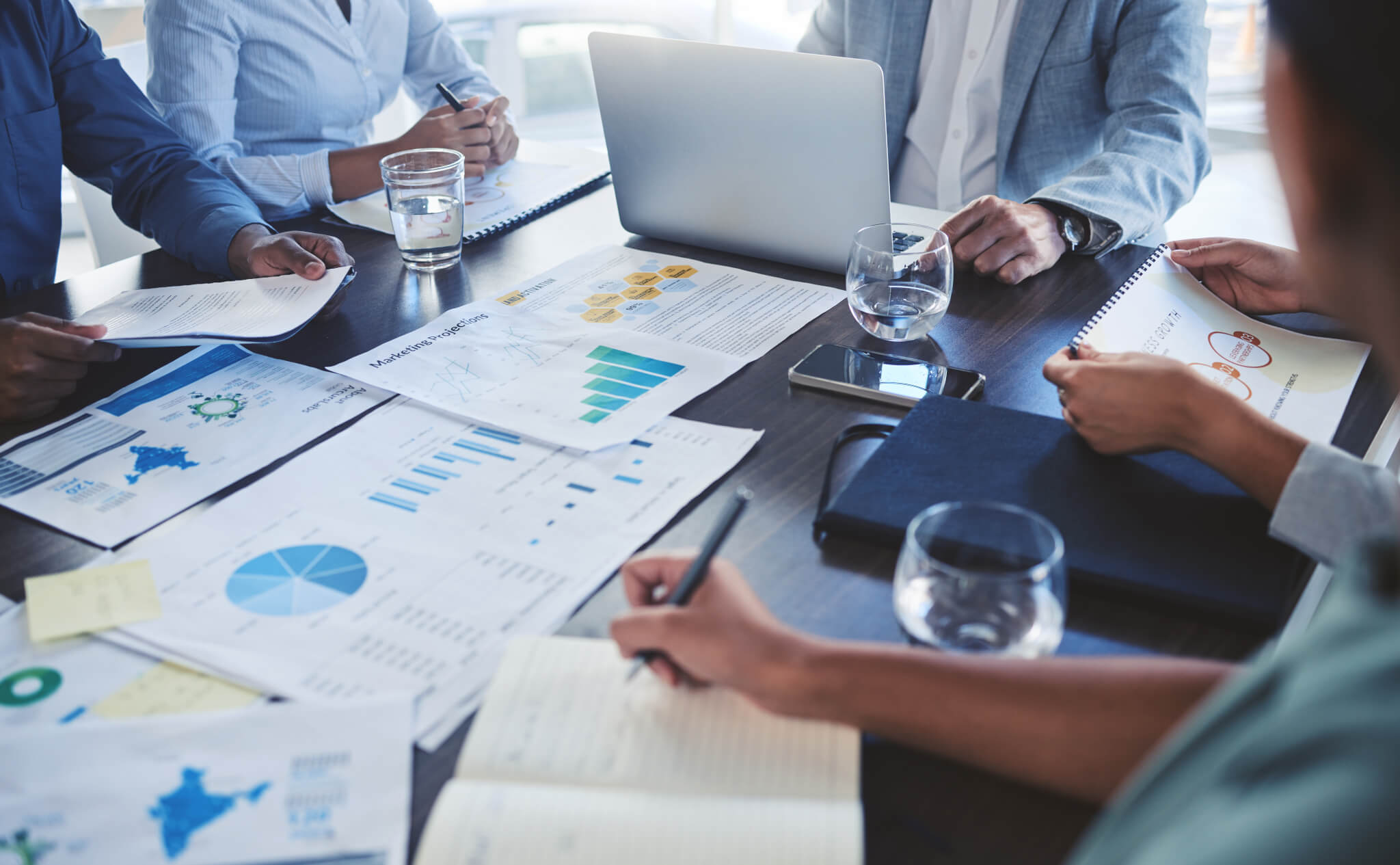 digital-marketing-planning-teamwork-and-strategy-business-meeting-in-the-office-collaboration-on-v.jpg